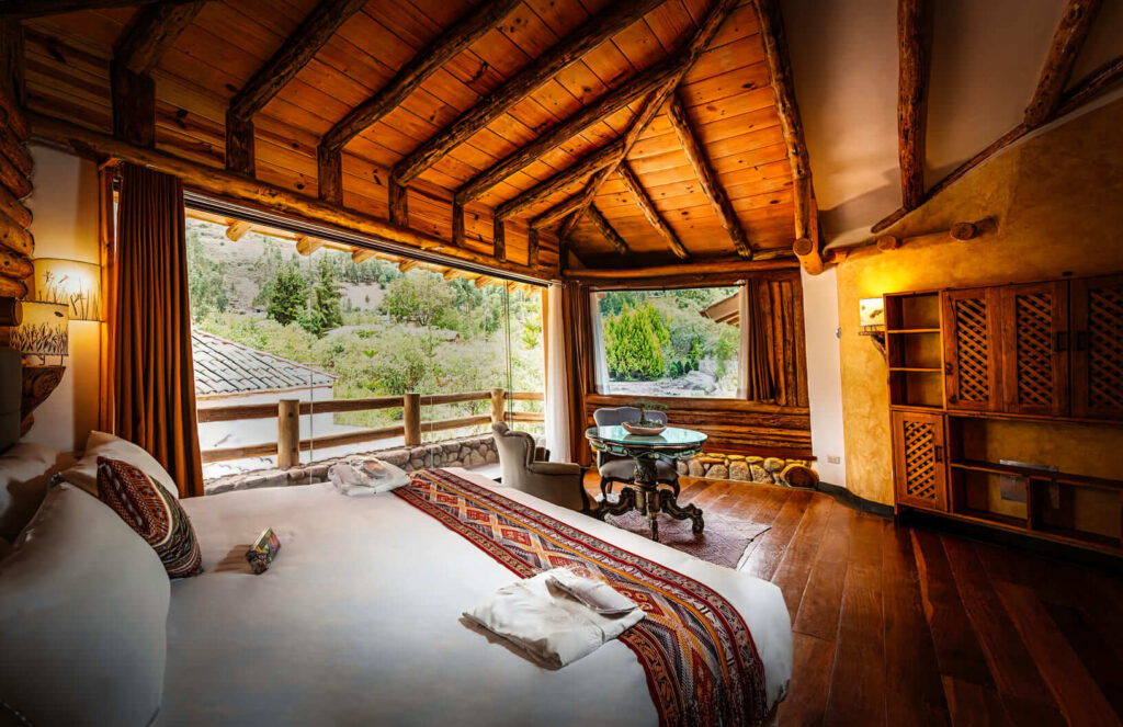 Embrace the perfect blend of natural wood architecture and elegant furnishings, all designed to harmonize with the breathtaking vistas of the Sacred Valley's landscape